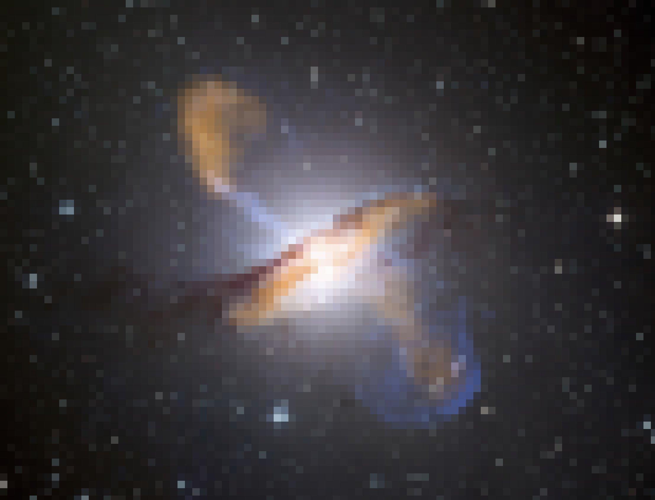 Foto der Galaxie „Centaurus A“, in deren Zentrum sich ein supermassives Schwarzes Loch befindet, das als Quasar weithin durchs All leuchtet