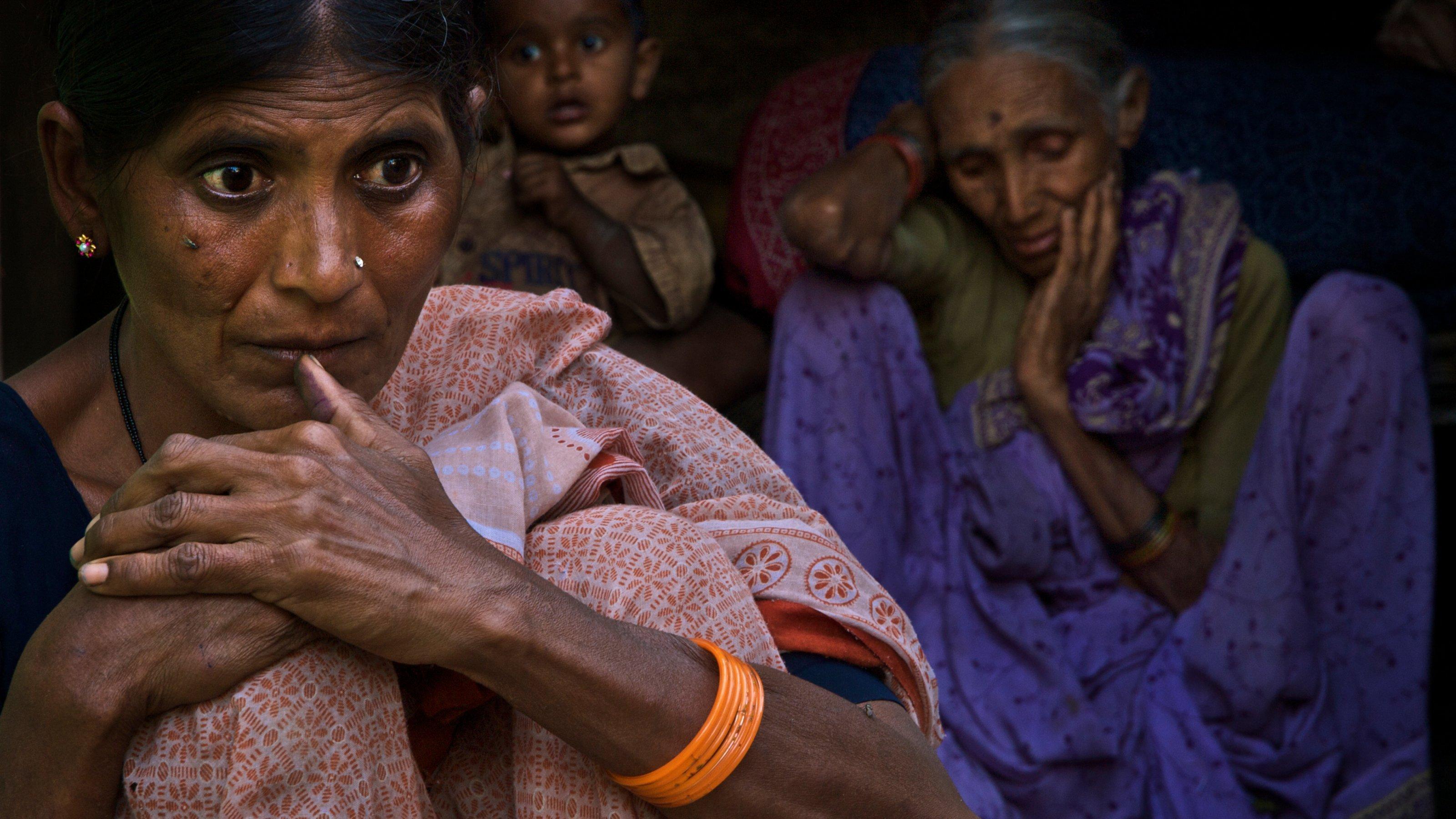 Parwatha Bai Ugewar mourns her husband's suicide. Even for comparatively big farmers like the Ugewars the economic pressure from cotton growing becomes unbearable when something unforeseen like an illness happens. To pay for medical bills, seeds, fertilizers, pesticides and labor Parwathas' husband Narain Ugewar took a loan of 134,000 Rupies (4000$US) from the bank and even more from moneylenders. With her husband gone the moneylenders threatening to take over the land.
