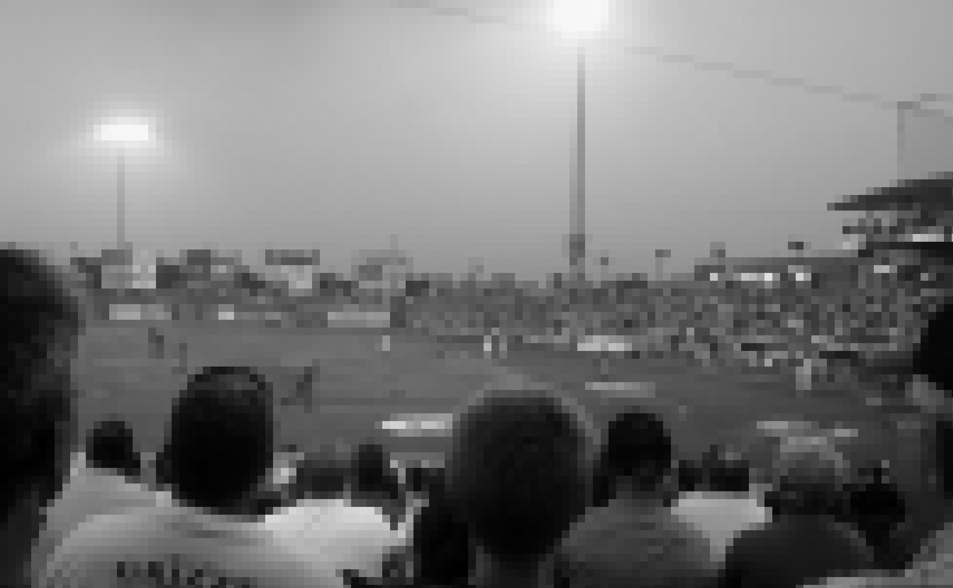 Blick von der Zuschauertribüne auf eine Baseballspiel.