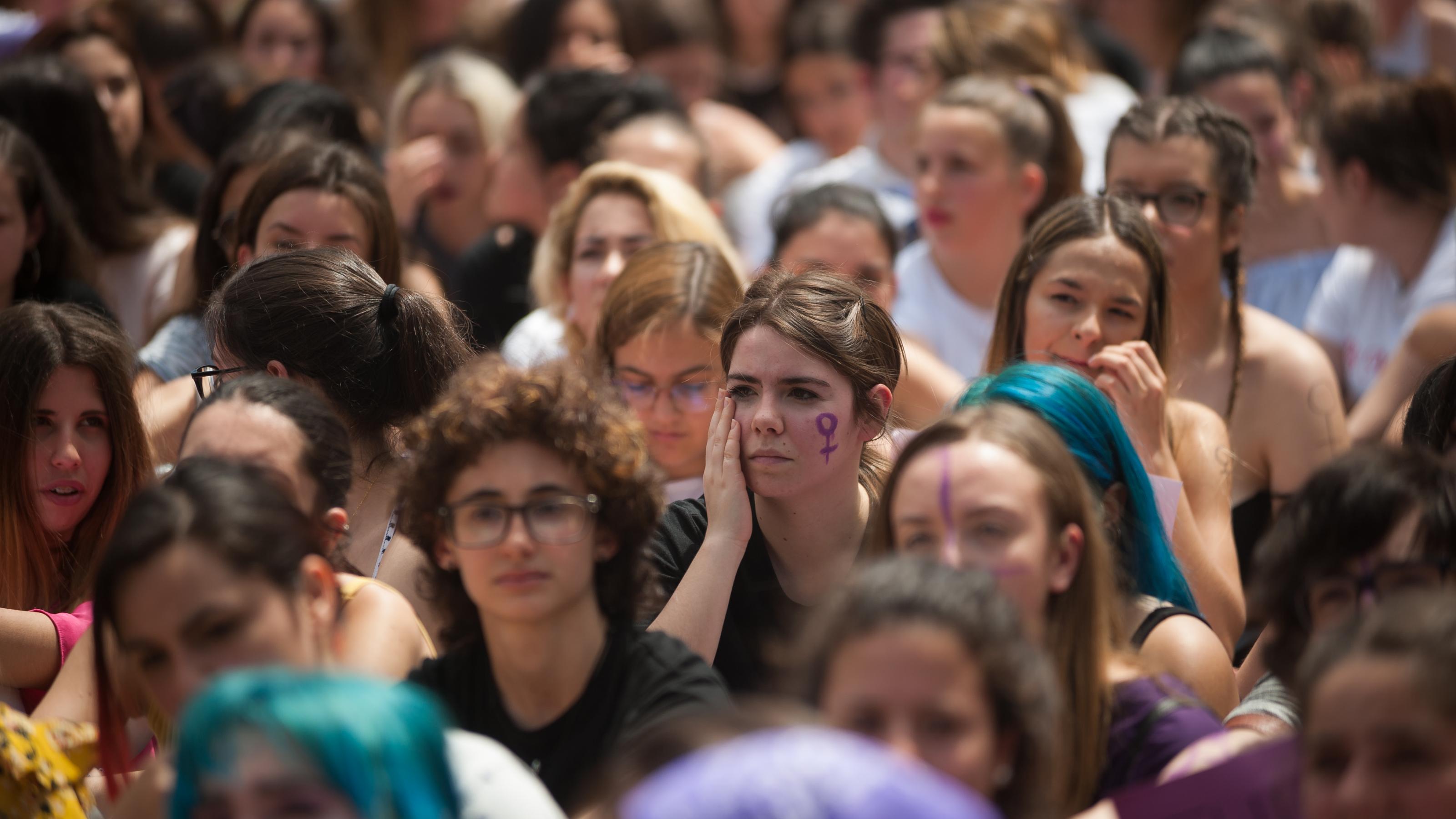 May 10, 2018 – Malaga, Spain – A protester with a feminist symbol seen during a feminist student strike against the sentence of 9 years in prison to five men (known as 'La Manada' or Wolf Pack) accused of the group rape of an 18-year-old woman during the San Fermin Festival in 2016