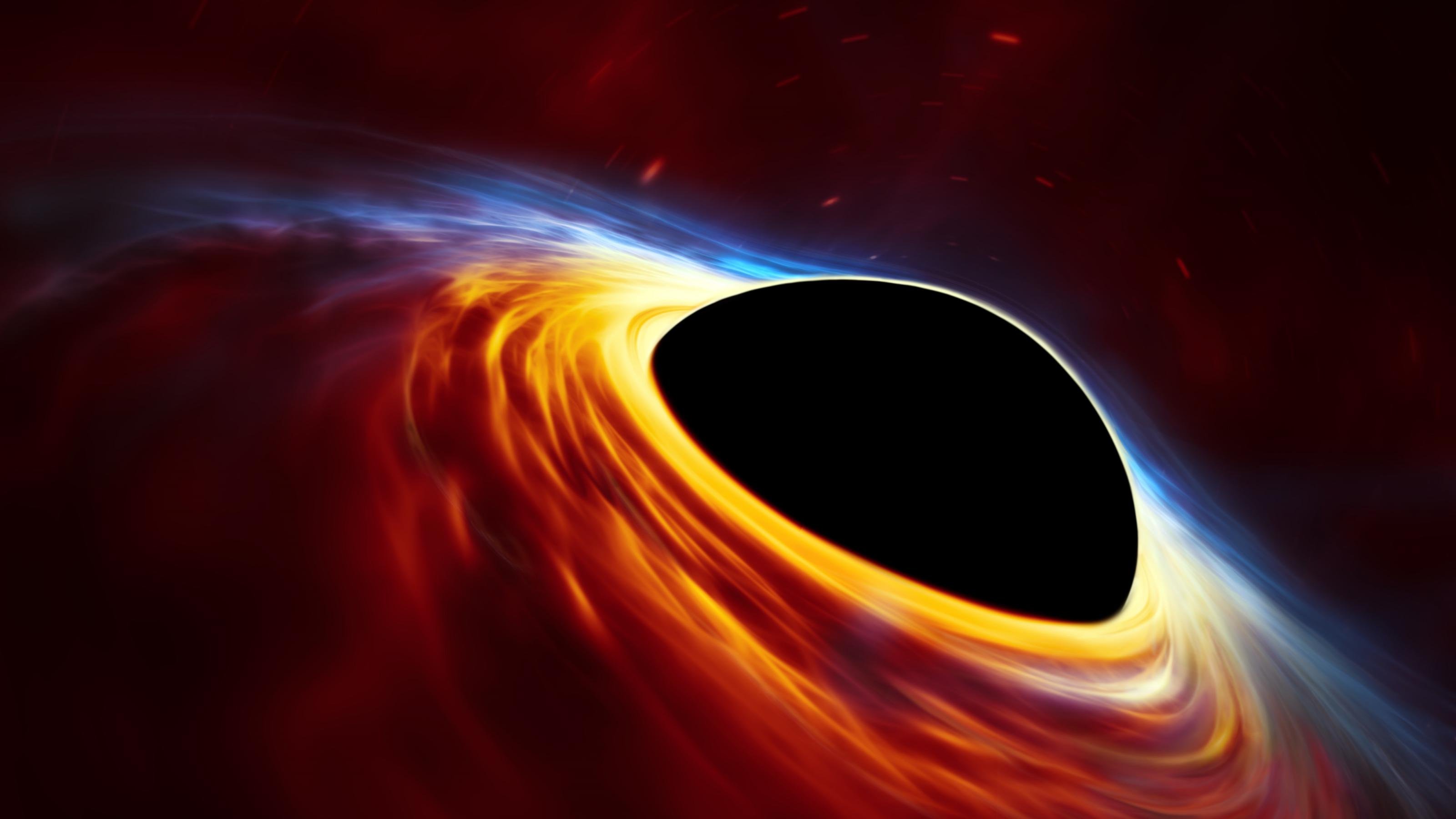 This artist?s impression depicts a rapidly spinning supermassive black hole surrounded by an accretion disc. This thin disc of rotating material consists of the leftovers of a Sun-like star which was ripped apart by the tidal forces of the black hole. Shocks in the colliding debris as well as heat generated in accretion led to a burst of light, resembling a supernova explosion.
