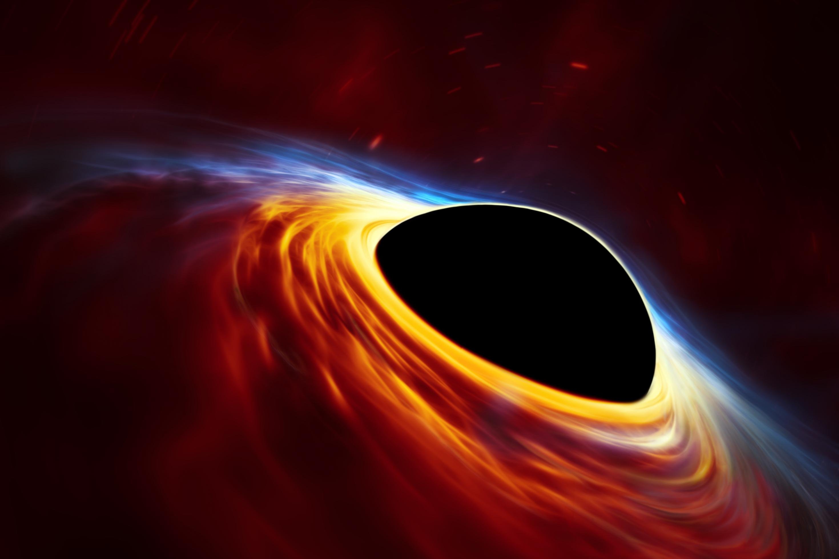 This artist?s impression depicts a rapidly spinning supermassive black hole surrounded by an accretion disc. This thin disc of rotating material consists of the leftovers of a Sun-like star which was ripped apart by the tidal forces of the black hole. Shocks in the colliding debris as well as heat generated in accretion led to a burst of light, resembling a supernova explosion.