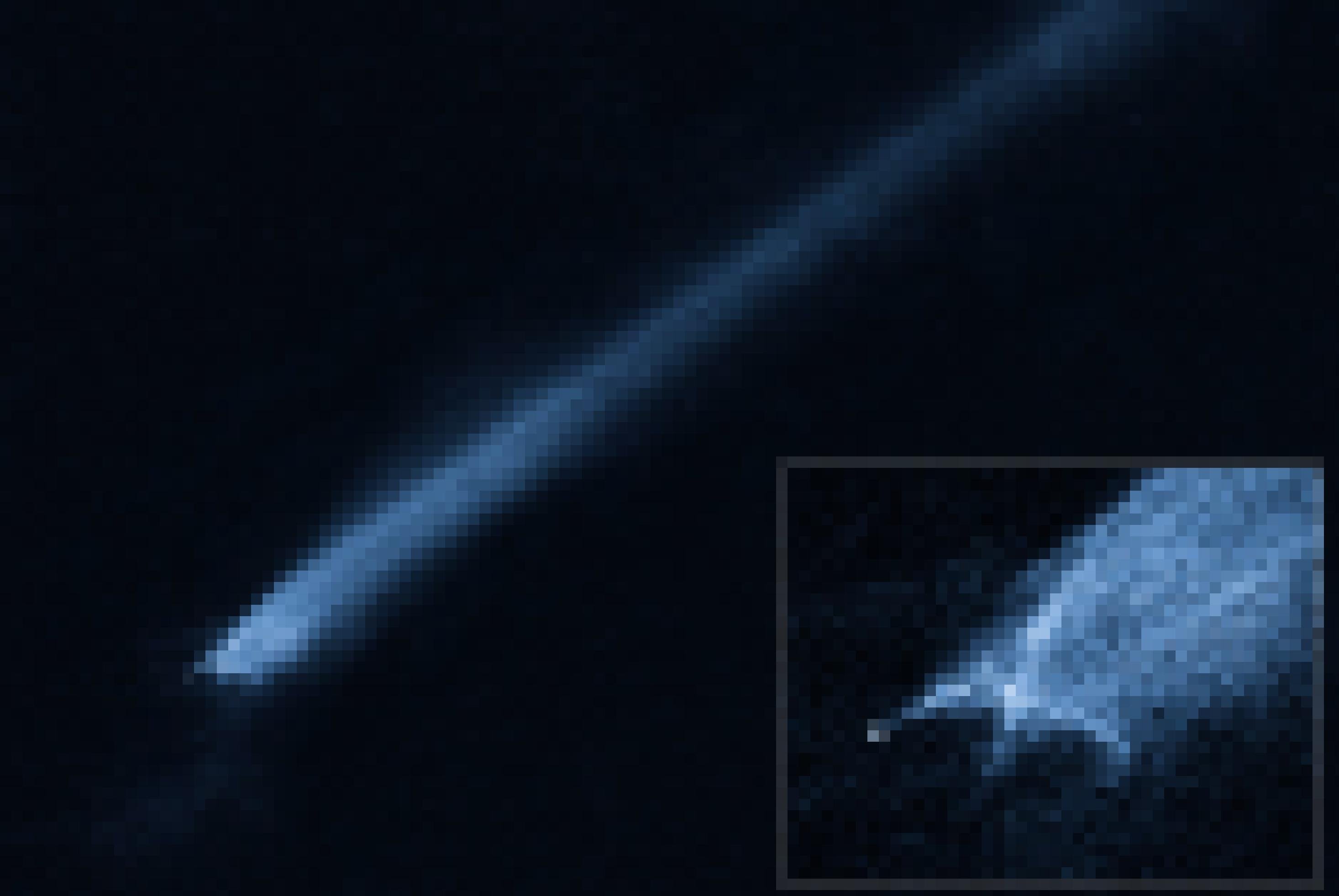 Ein blauer Asteroid mit einem langen Schweif