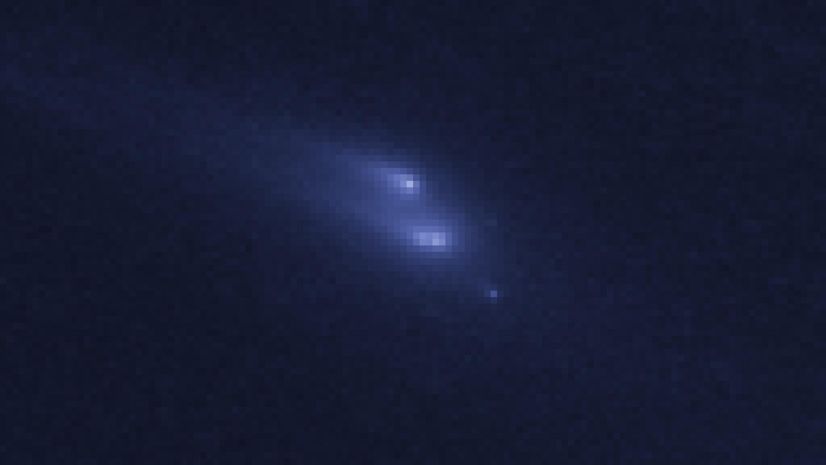 Blaue verwaschene Striemen um einen hellen Fleck, als Asteroid P/2013 R3 zerbricht