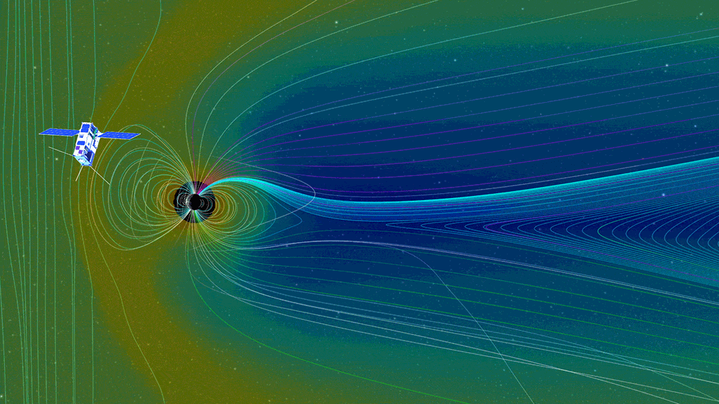 Links befindet sich eine kleine Raumsonde, relativ mittig die Erde. Bewegende Wellen, die hier farbig dargestellt sind, sollen das Magnetfeld der Sonne zeigen, dass sich um die Erde herum bewegt.