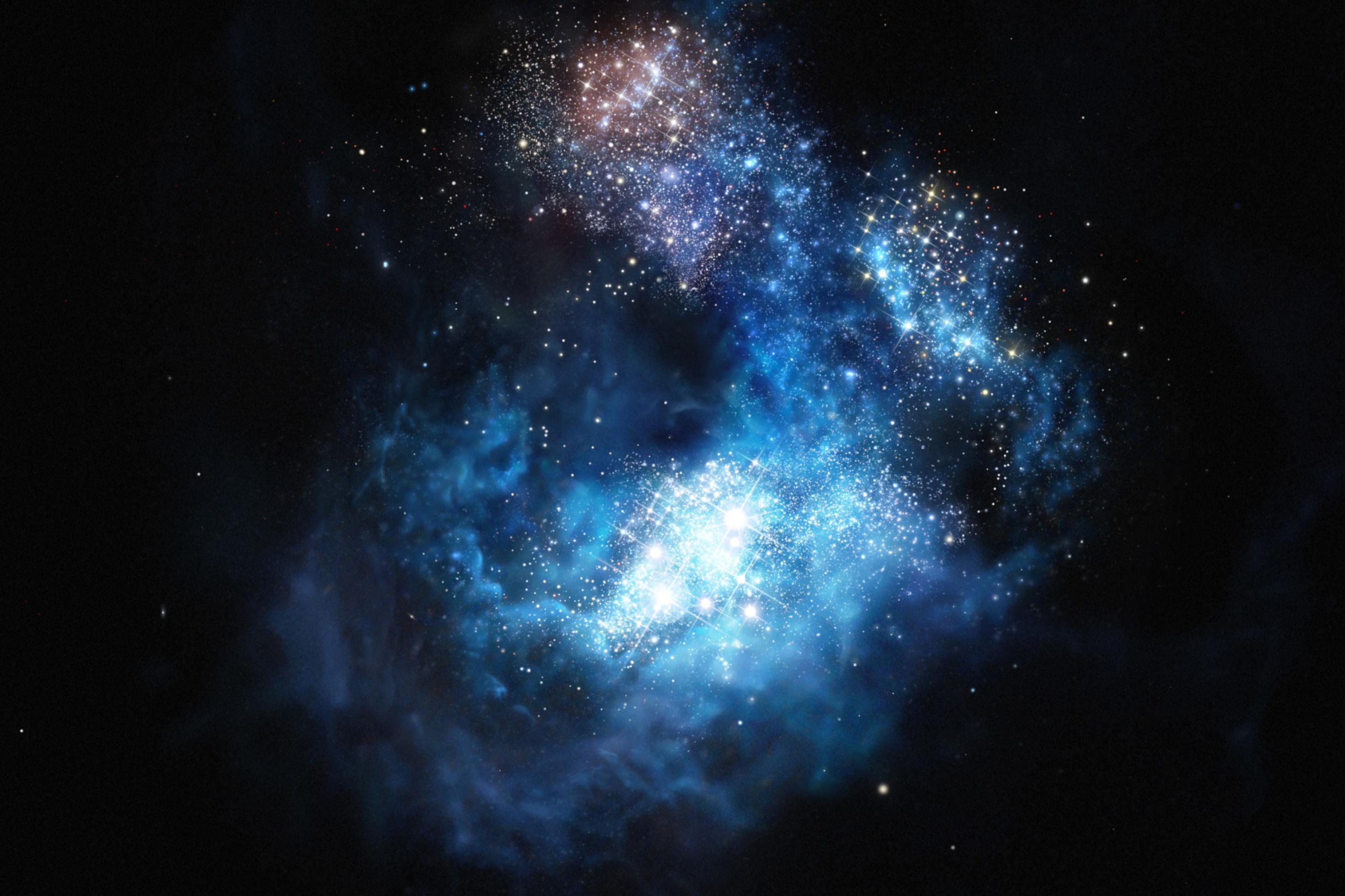 Eine Art bläuliche Wolke mit zahlreichen hell leuchtenden Sternen.