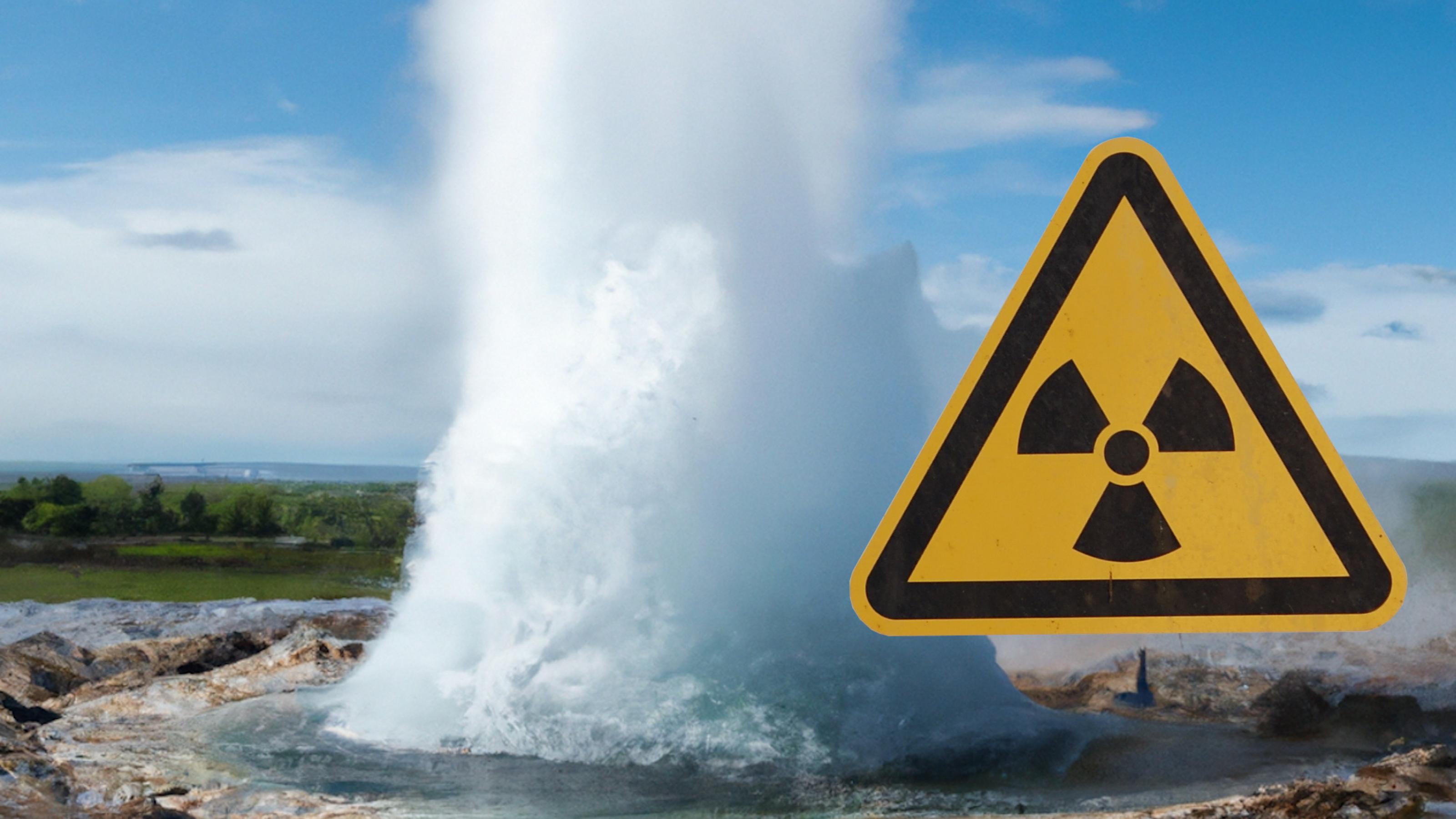 Eine Wasserfontäne eines Geysirs, der aus einem Schlammloch hervorschießt. Davor montiert: ein Schild, das vor Radioaktivität warnt, ein Kreis, umgeben von drei nach außen gerichteten Dreiecken.