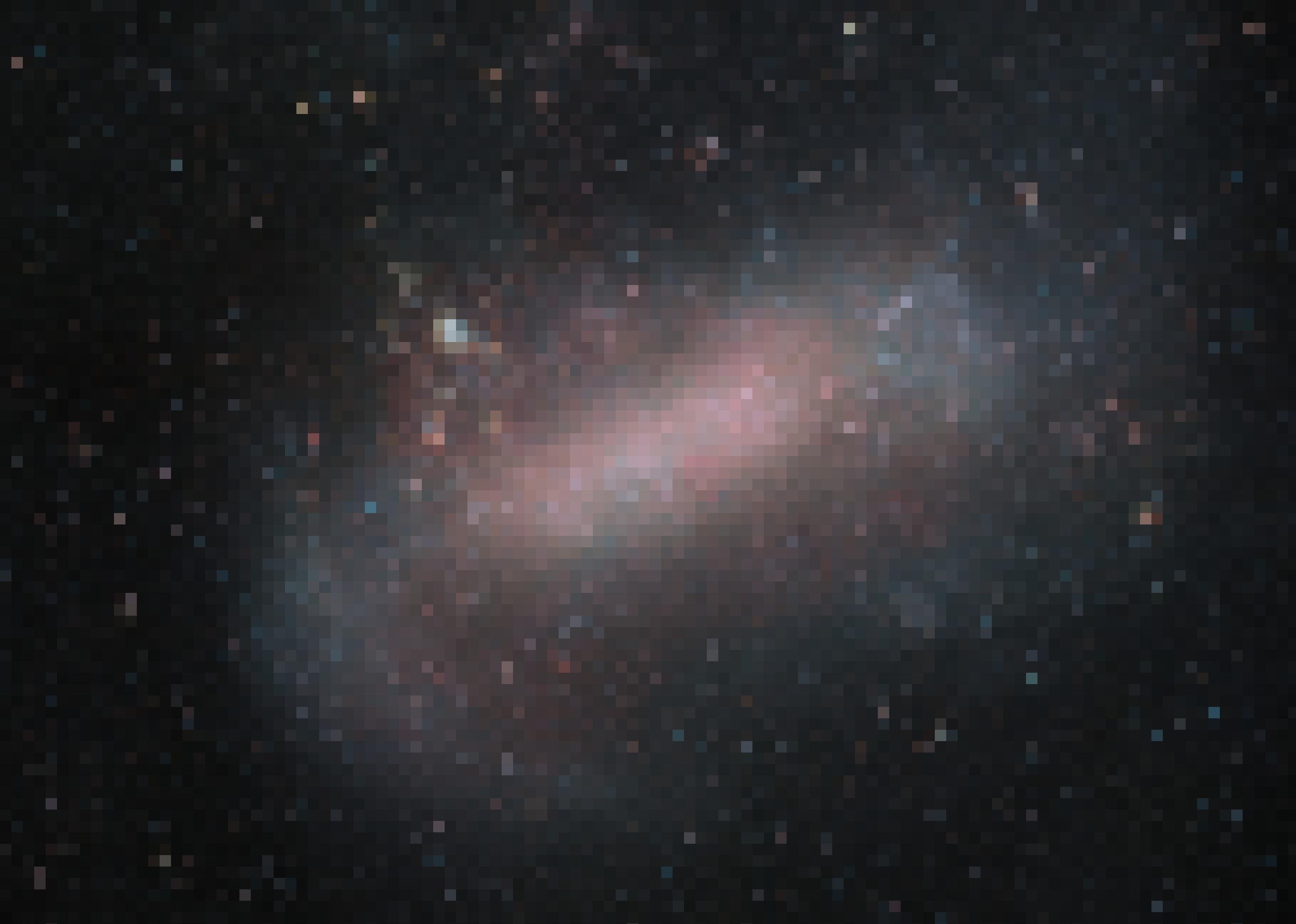 Zu erkennen ist eine große, wenig geordnete Ansammlung von Sternen, die sich in der Bildmitte konzentrieren und dort vorwiegend rötlich sind, aber auch weiter außen befinden, dort mehr bläulich oder weiß gefärbt. Es handelt sich um die Große Magellansche Wolke, eine Zwerggalaxie, die unsere Milchstraße begleitet, aber im Gegensatz zu dieser keine komplexe Struktur erkennen lässt. Wahrscheinlich sind die größeren Spiralgalaxien einst durch Fusionen solcher Zwerggalaxien entstanden. Aufgenommen wurde das Foto vom VISTA-Teleskop der ESO auf dem Cerro Paranal in Chile.