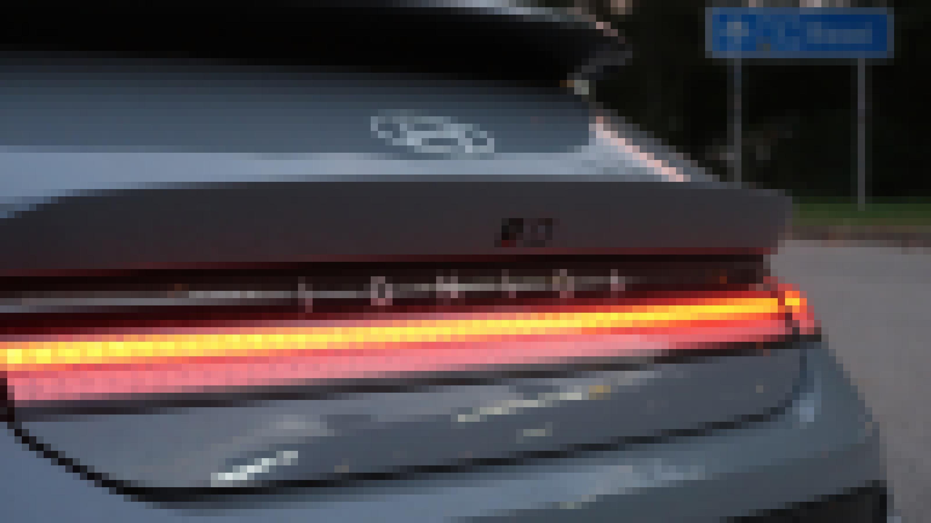 Nahaufnahme der leuchtenden Rücklichter beim Hyundai Ioniq 6.