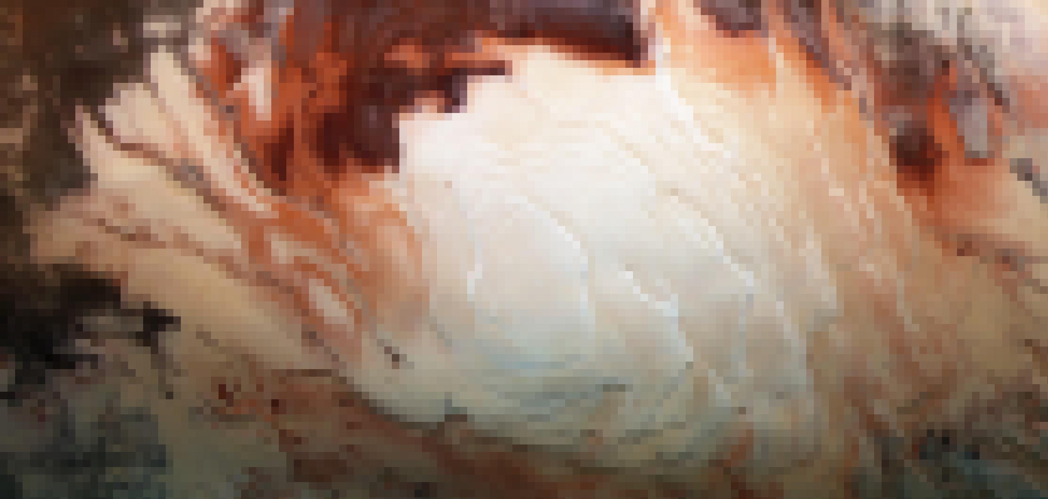 Der Südpol des Mars mit den spiralförmig gedrehten Gletschern wirkt wie der Schaum auf einer Tasse Cappuccino