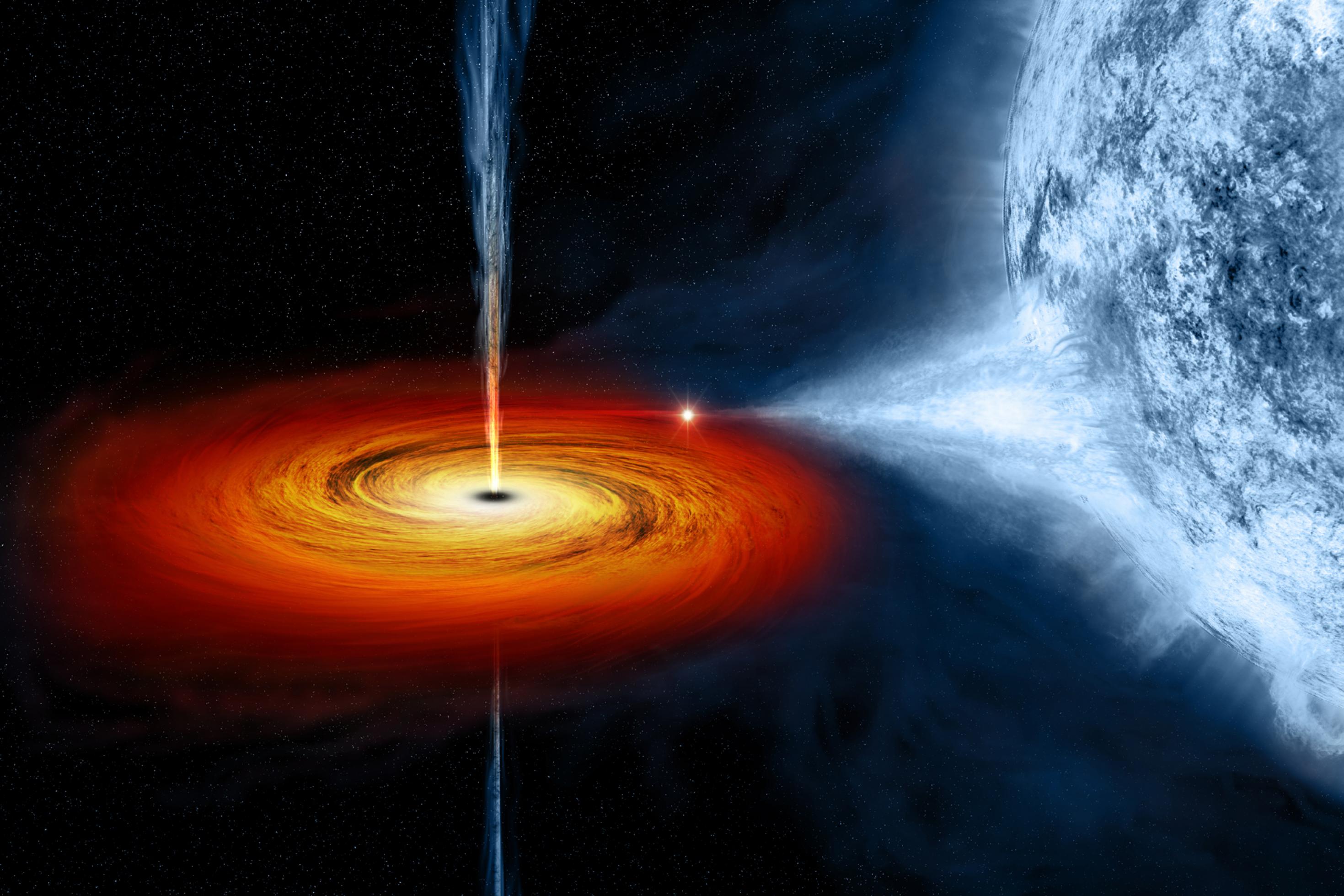 Hier wird eine Illustration des stellaren Schwarzen Loches Cygnus X-1 gezeigt, das sich im Sternbild Schwan befindet. Rechts im Bild zu sehen ist der bläulich leuchtende Partnerstern, der das Schwarze Loch begleitet. Von ihm aus wird Materie zum Schwarzen Loch hinüber gezogen. Die Materie-Teilchen erhitzten sich durch die Reibung und  formen eine glühende Scheibe, von der Teile ins Schwarze Loch stürzen, während andere als Jet senkrecht nach oben oder unten weggeschleudert werden