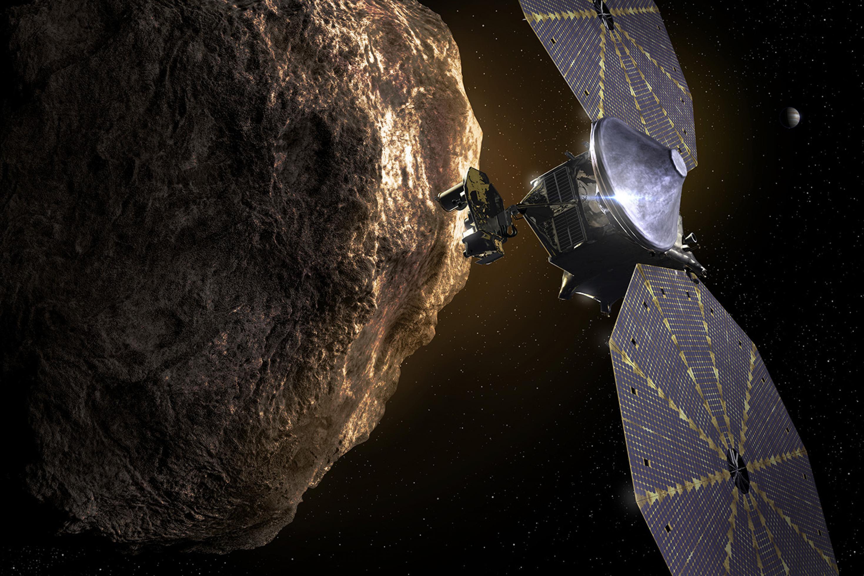 Die Grafik zeigt Raumsonde Lucy mit zwei kreisförmigen Solarzellen und einen bräunlichen Asteroiden.