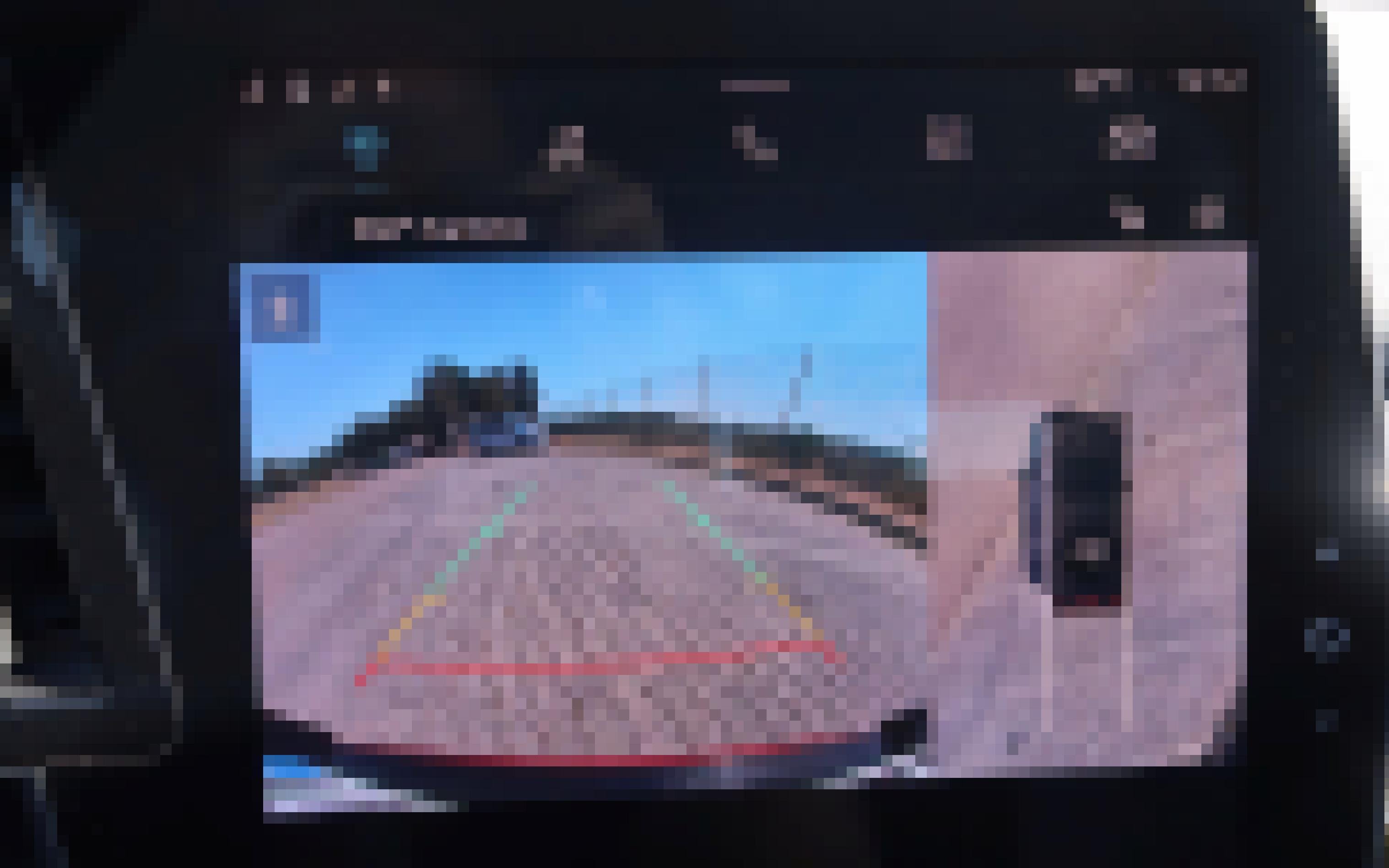 Bildschirm zeigt 3D-Ansicht des Renault Megane E-Tech Electric an