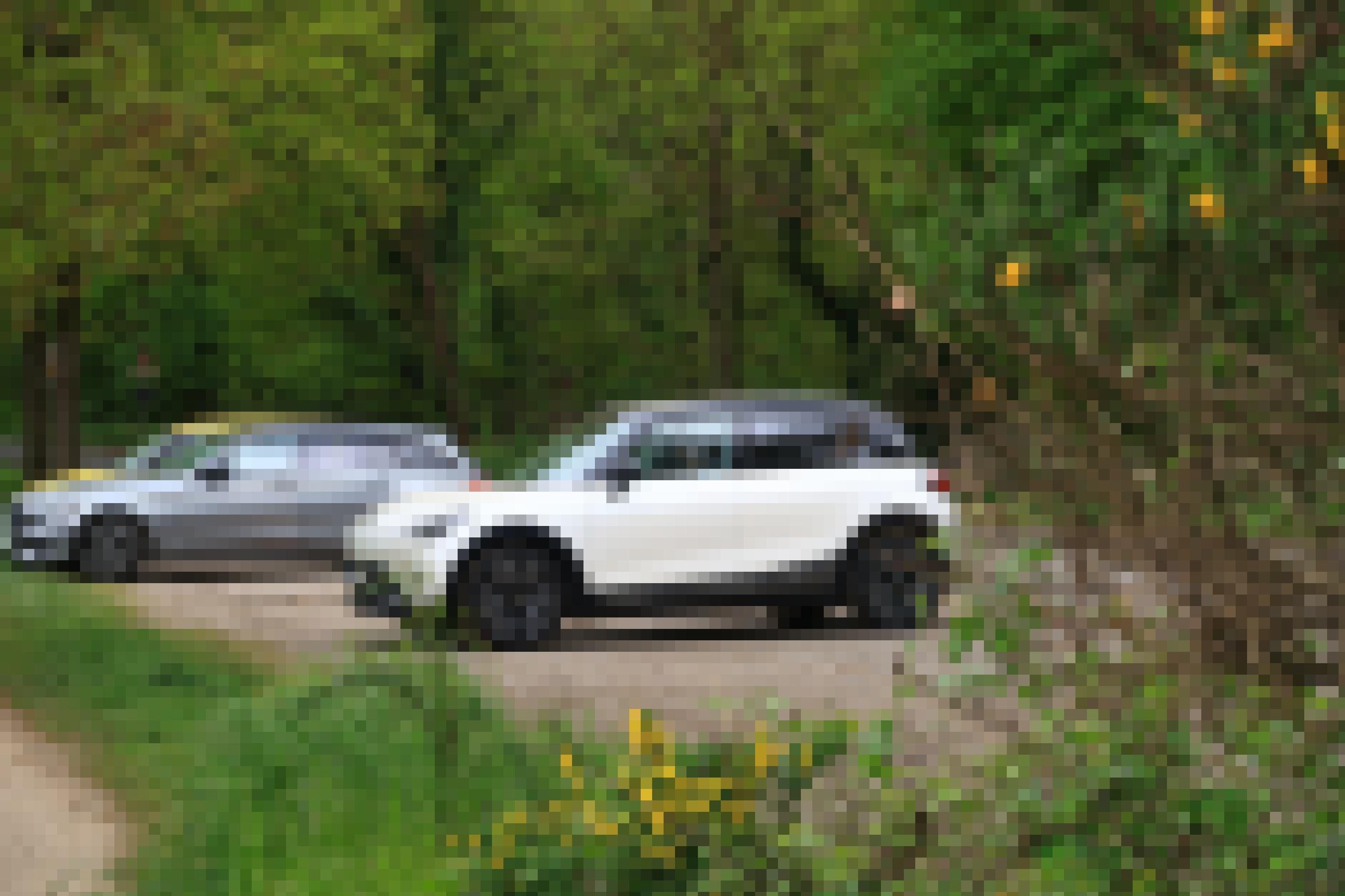 Der Smart #1 parkt auf einem Waldparkplatz.